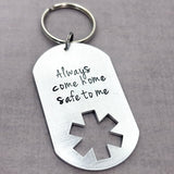 EMS dog tag keychain with Always come home safe to me stamped on it.