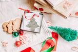 Christmas tree shaped ornament with little stamped lights and names