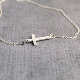 Sterling silver sideways cross necklace