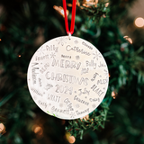 Round Christmas ornament with names on a tree