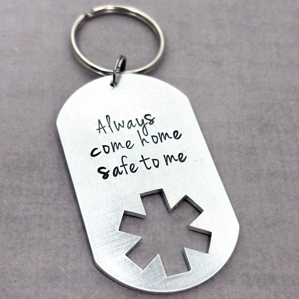 EMS dog tag keychain with Always come home safe to me stamped on it.