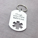 EMS dog tag keychain with Always come home safe to me stamped on it.