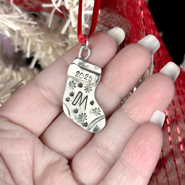 Personalized Christmas Ornament, Initial Stocking Ornament in hand to show small size.