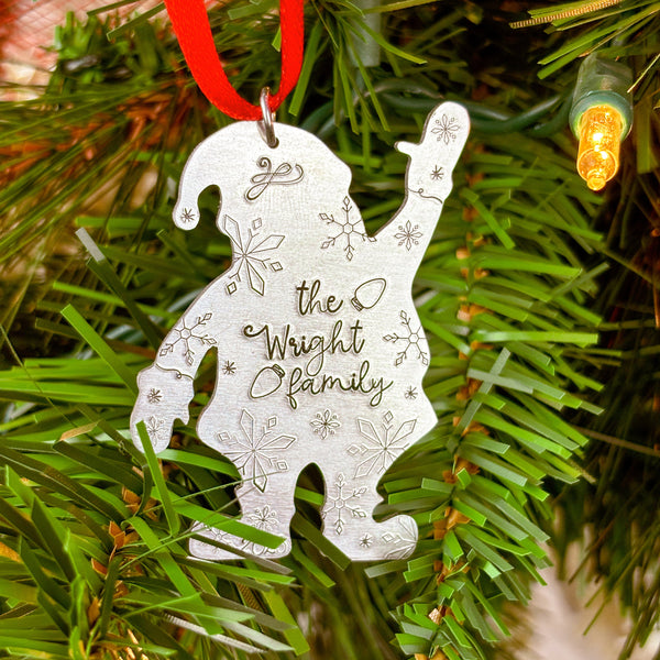 Decorative ornament with custom " Family' text on a Christmas tree.