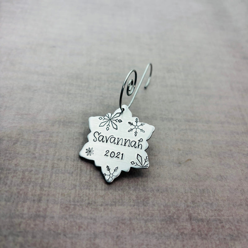 Small snowflake ornament with 1 personalized name.
