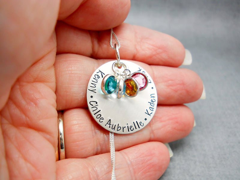 Sterling Silver Personalized Mom Necklace with Kids Names, modeled in hand