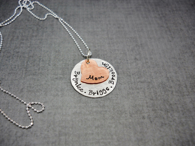 Sterling Silver and Copper Custom Mothers Necklace With Kids Names, flat lay