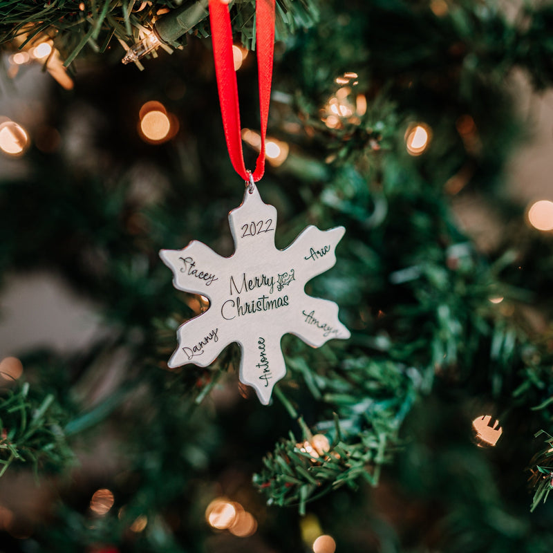 Snowflake Family Christmas ornament on red ribbon