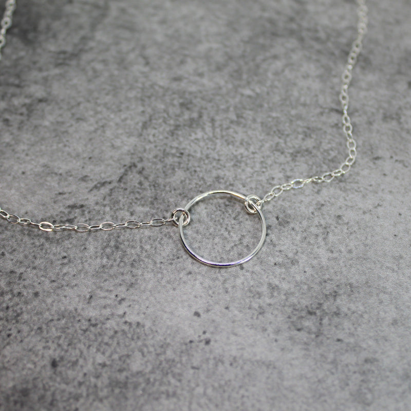 Smooth Sterling silver Karma necklace