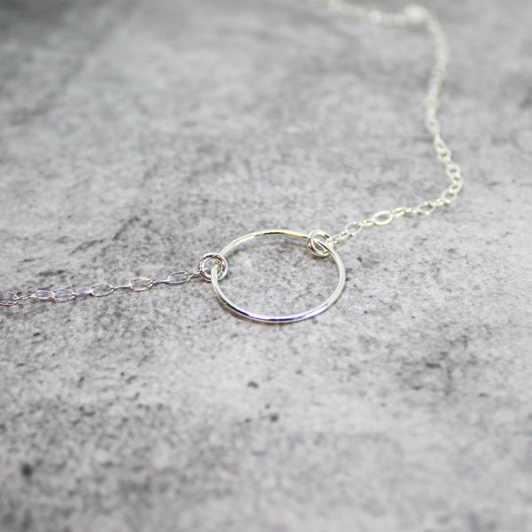 smooth sterling silver karma necklace