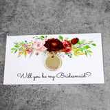 gold bridesmaid necklace on proposal card