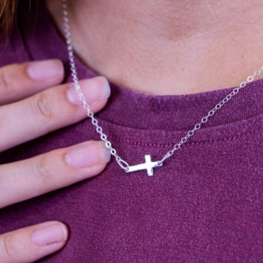 Sterling silver hammered sideways cross necklace